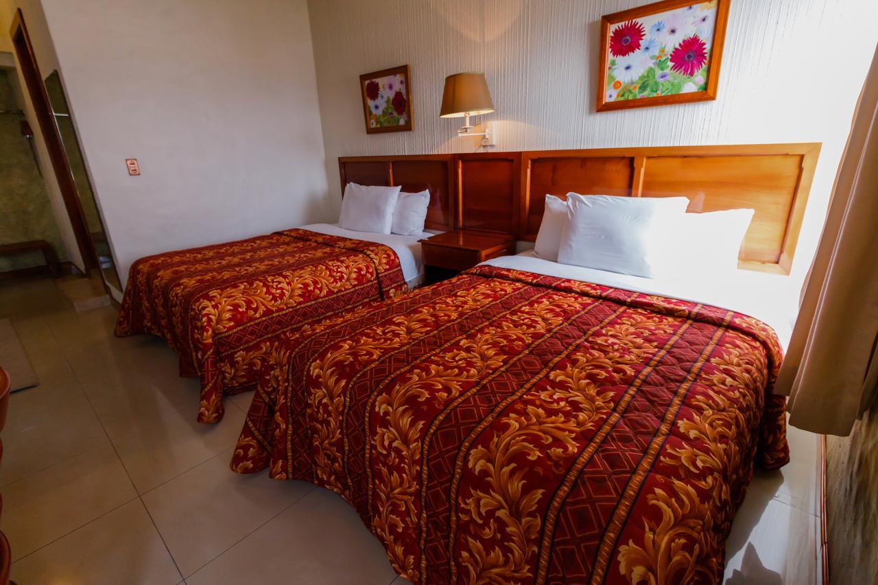Hotel Anna Inn Olintepeque Quarto foto